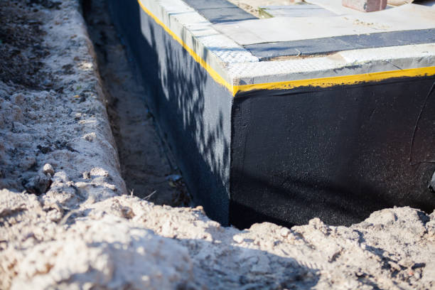 Professional Interior Drainage System technician working in Washington, IN